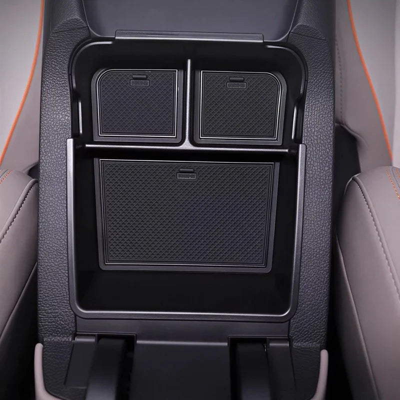 Black textured TPE car center console organizer tray for BYD interior protection.