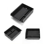 Black textured non-slip car center console organizer tray for BYD accessories.