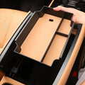 Black ABS plastic center console organizer tray with tan interior for BYD car interior.