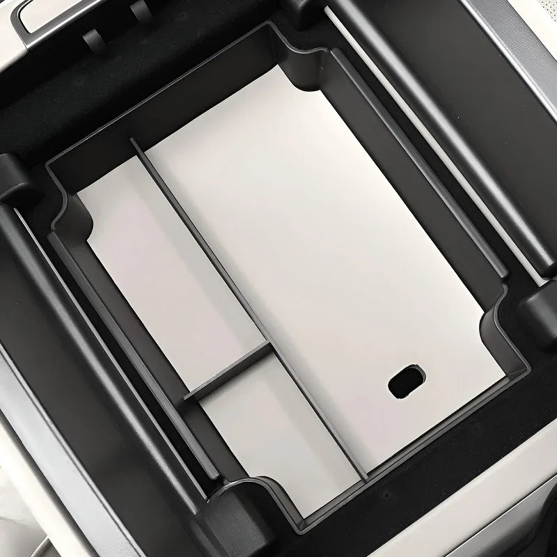 Black heavy-duty plastic car trunk organizer tray with white interior lining