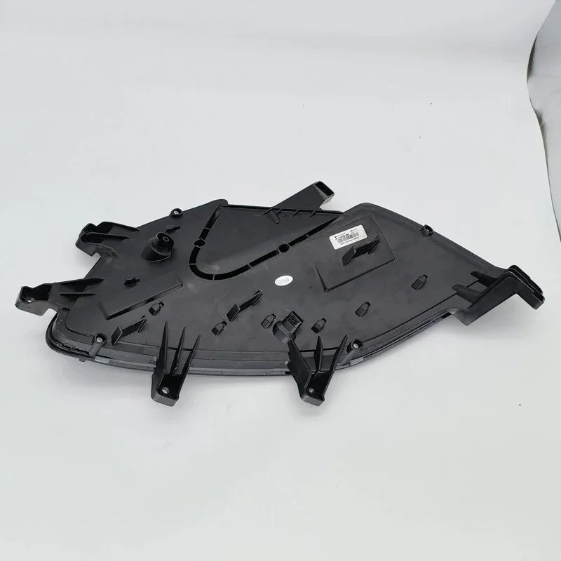 Durable black matte plastic automotive rear light housing component.