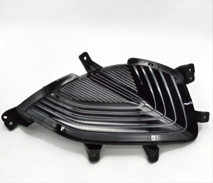 Glossy black ABS plastic car grille insert with a textured slatted design