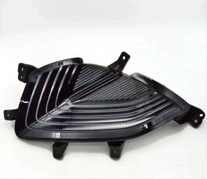 Glossy black automotive front grille insert with a sleek, ribbed design.