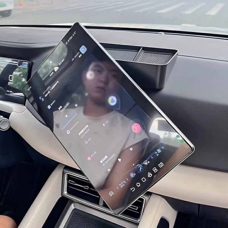 High-definition tilted touchscreen infotainment system installed in a car interior.