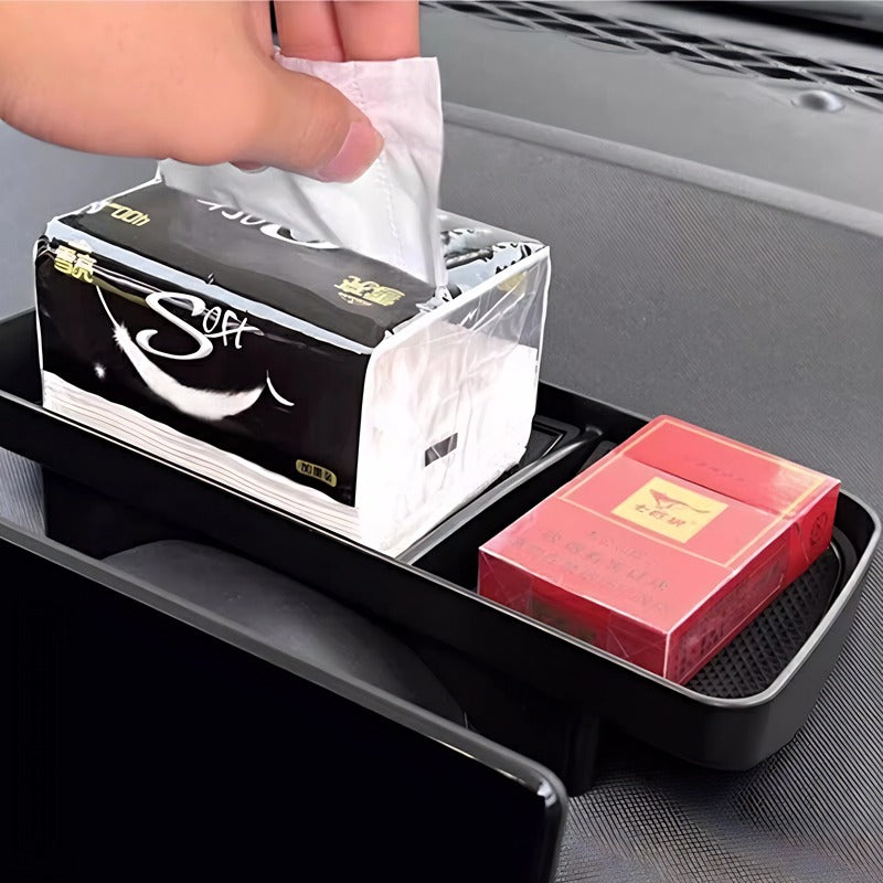 Black plastic car console organizer holding a tissue box and a red storage case.