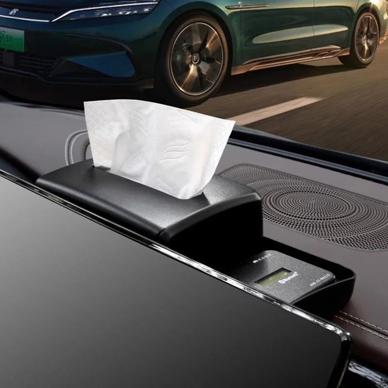 Black leather car tissue box holder with sleek design installed on a vehicle center console.