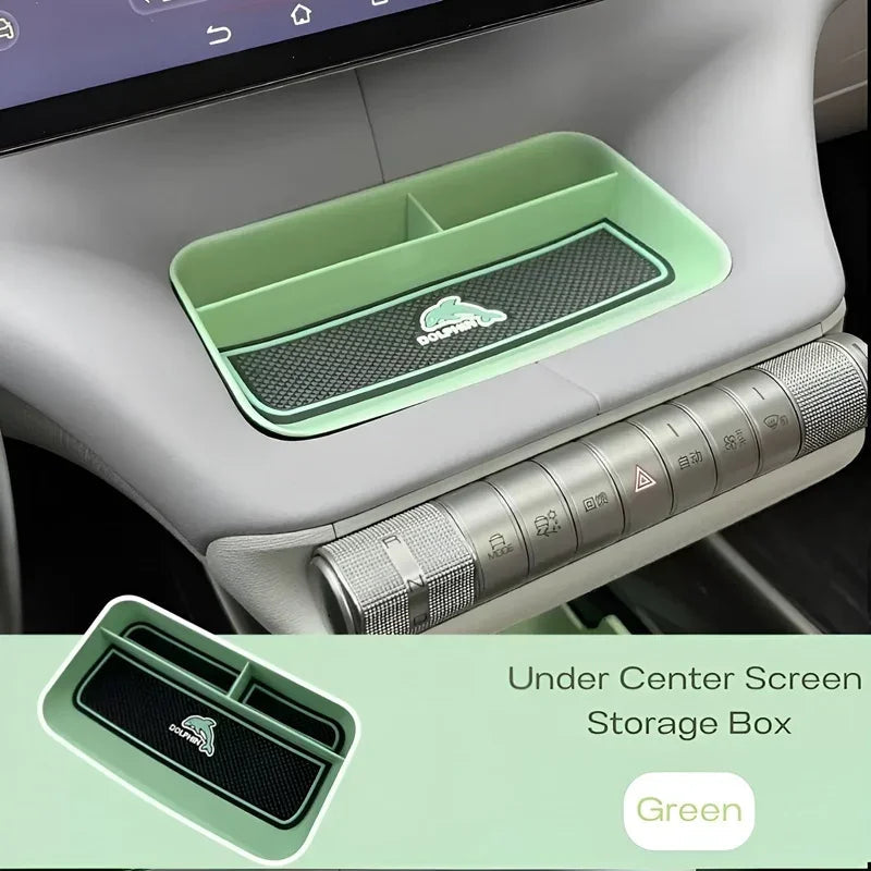 Green under center screen storage box for BYD Dolphin with anti-slip carbon fiber texture.