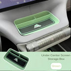 Green under center screen storage box for BYD Dolphin with anti-slip carbon fiber texture.