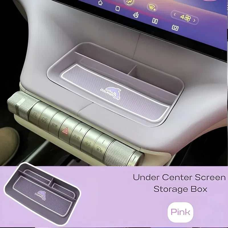 Pink under center screen storage box for BYD Dolphin, made of durable material.