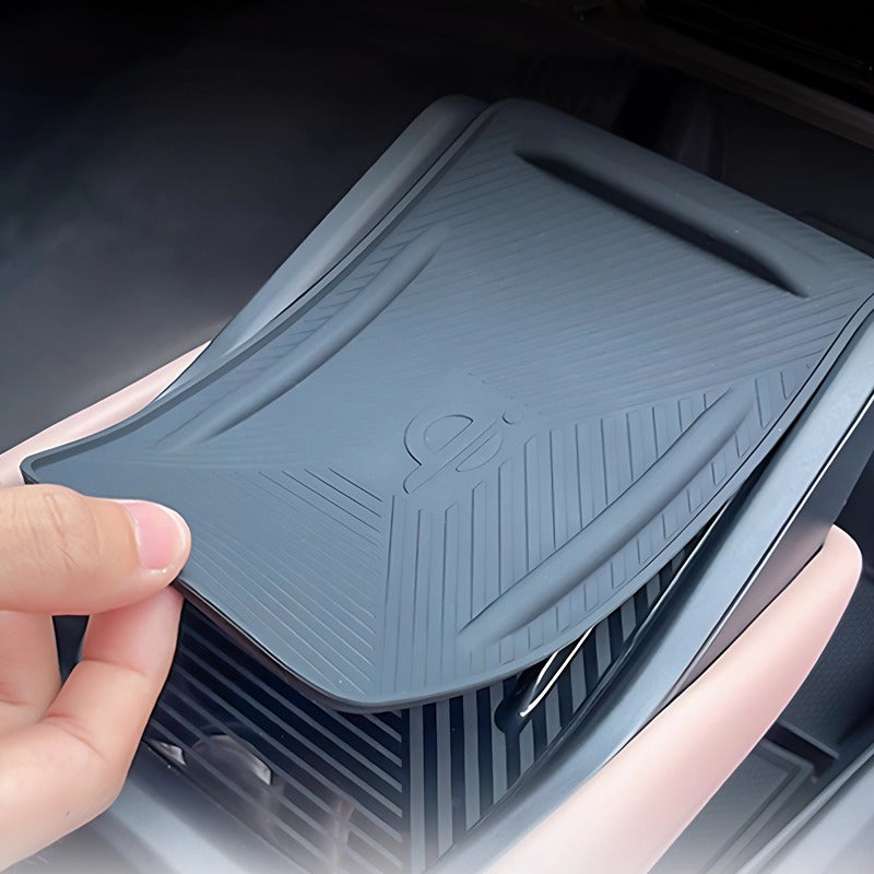 Close-up of a grey textured plastic car accessory panel with a professional matte finish.
