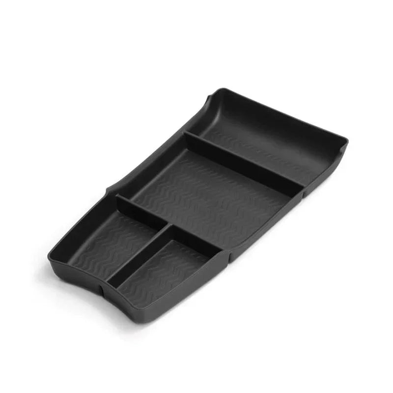 Black matte plastic car console organizer tray with three divided compartments and textured bottom