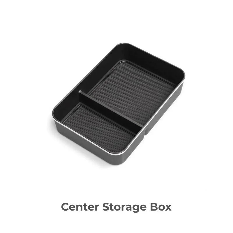 Black dual-compartment center console storage box made of durable non-slip material.