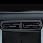 Dual black matte air conditioning vents with sleek chrome-finished trim for BYD interior.