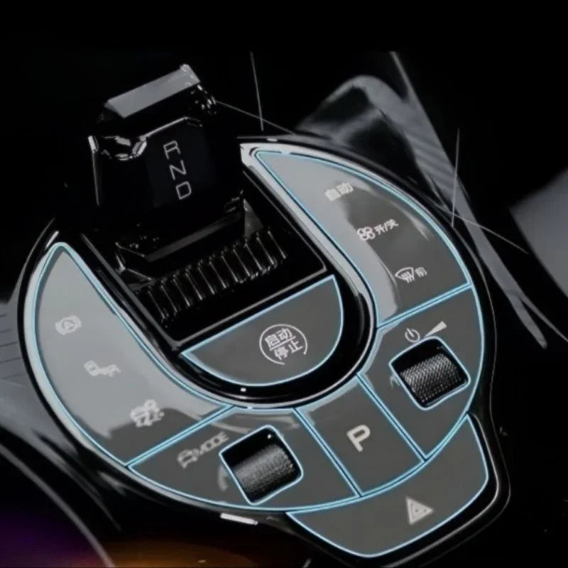 Black gloss electronic gear shifter with blue LED light accents and tactile control buttons.