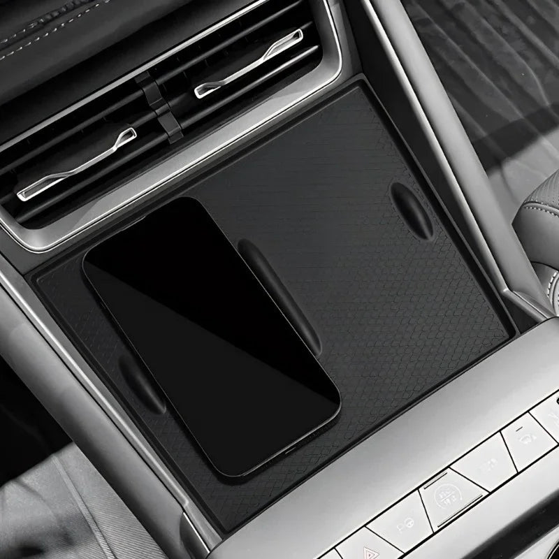 Black anti-slip silicone center console mat with textured pattern for BYD car interior protection.