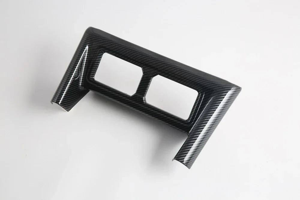 Black carbon fiber interior trim panel with a glossy finish for BYD vehicle enhancement.