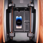 Black premium leather organizer tray with smartphone slot and storage compartments in tan interior.