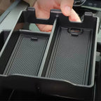 Black textured non-slip organizer tray for car center console, durable high-quality material.