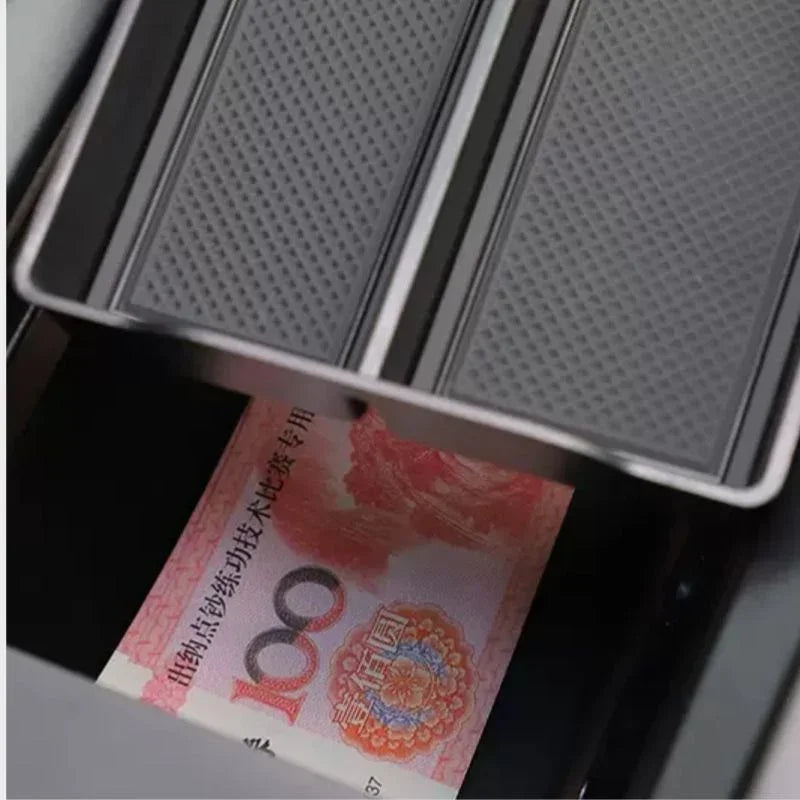 Black textured anti-slip car floor mat protecting a 100 Yuan banknote in a storage compartment.