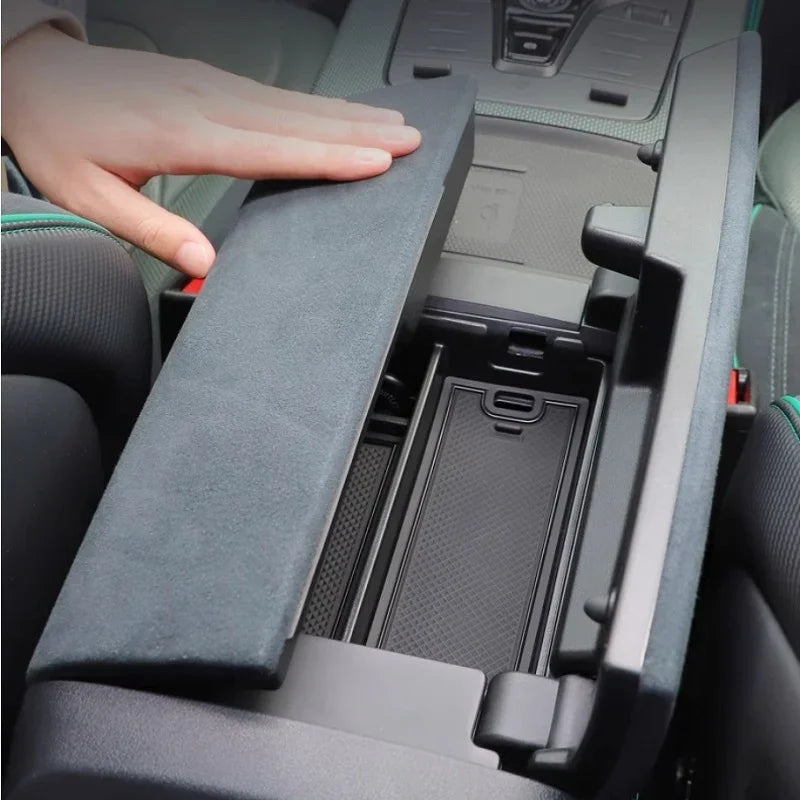 Grey suede center console organizer box for car interior storage.
