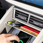 White custom-fit car dashboard organizer tray holding a key fob and small items.