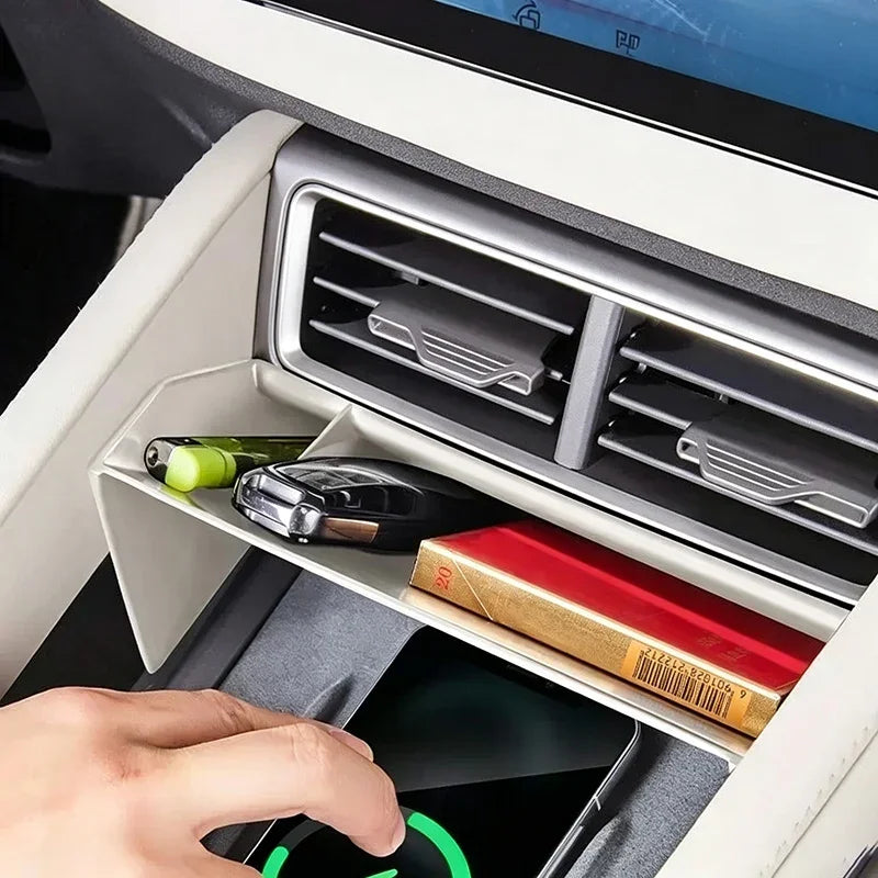White custom-fit car dashboard organizer tray holding a key fob and small items.