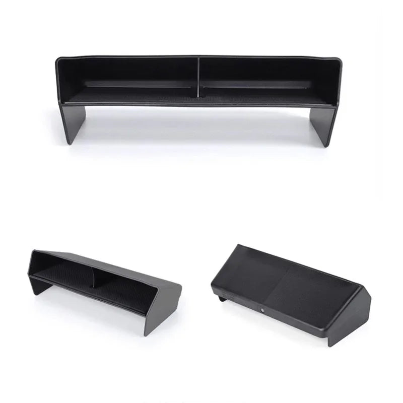 Black textured carbon fiber pattern car center console organizer tray.