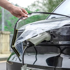 Transparent waterproof EV charging port cover with black reinforced edges for BYD protection.