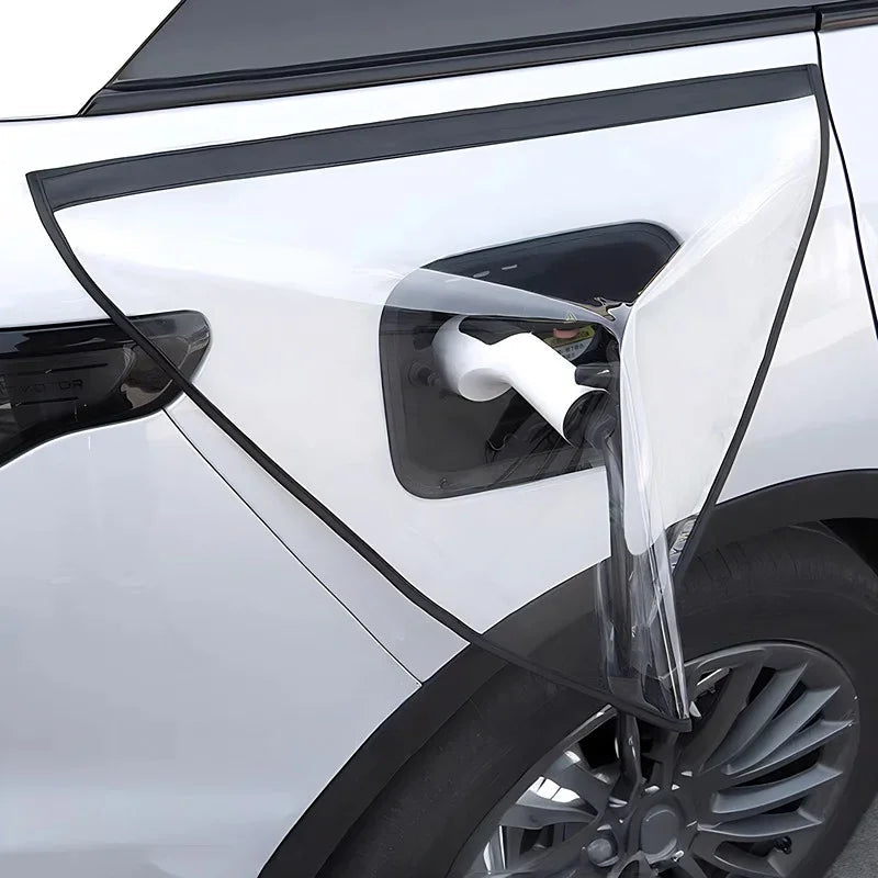 Transparent TPU protective film covering the electric vehicle charging port area.