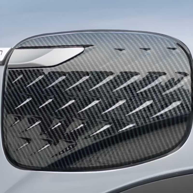 Black carbon fiber texture side mirror cover for BYD, featuring a sleek glossy finish.