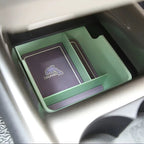 Green and grey Dolphin brand car organizer tray inside a BYD vehicle storage compartment.