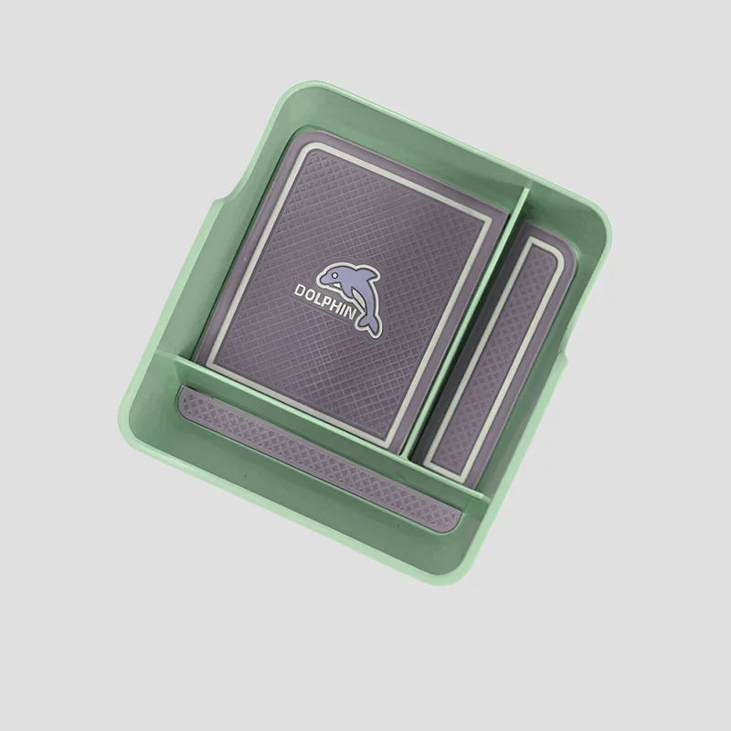 Green BYD car console organizer tray with purple non-slip liner and dolphin logo