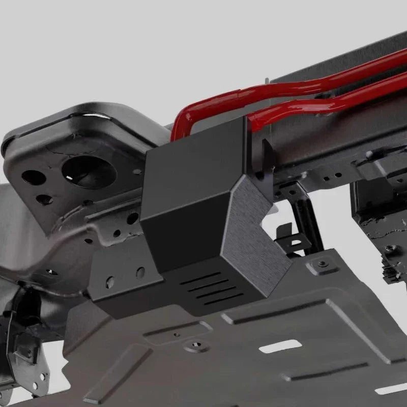 Black heavy-duty metal underbody skid plate protecting the vehicle chassis and components.