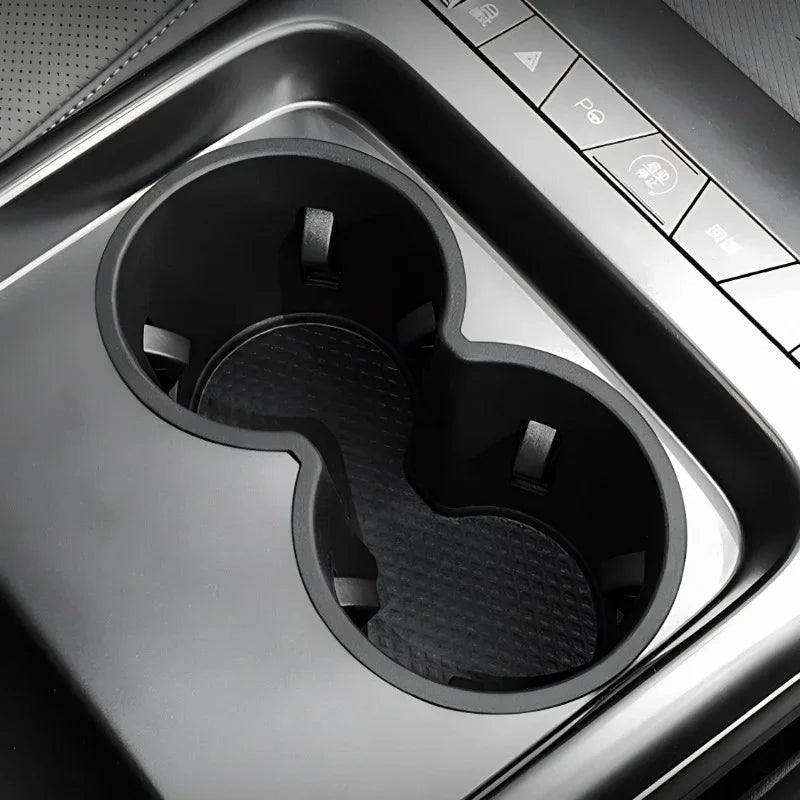 Black matte dual cup holder accessory for BYD interior, featuring a durable textured finish.