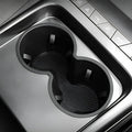 Black matte dual cup holder accessory for BYD interior, featuring a durable textured finish.