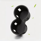 Dual-compartment matte black silicone car cup holder organizer for BYD accessories.