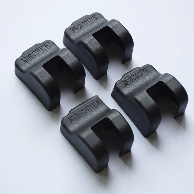 Four matte black durable plastic protective covers for BYD vehicle components.