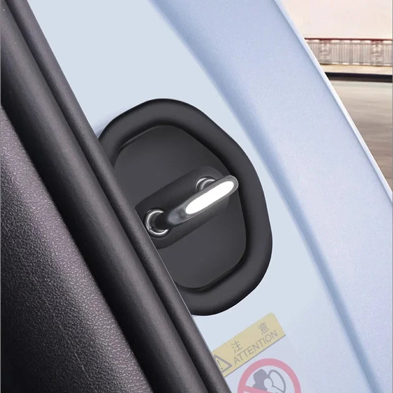 Black matte protective door latch cover for BYD car door, made of durable high-quality material.