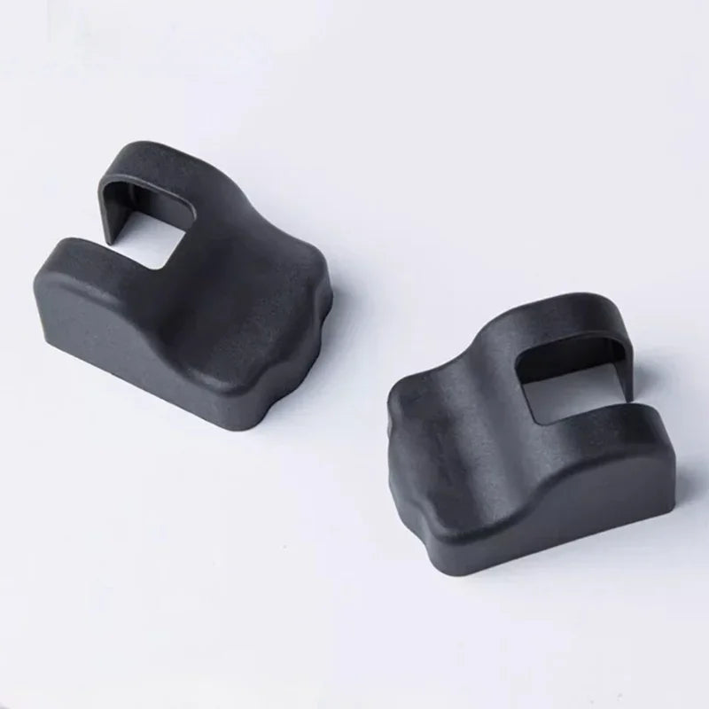Pair of durable matte black ABS plastic protective covers for BYD vehicle components.