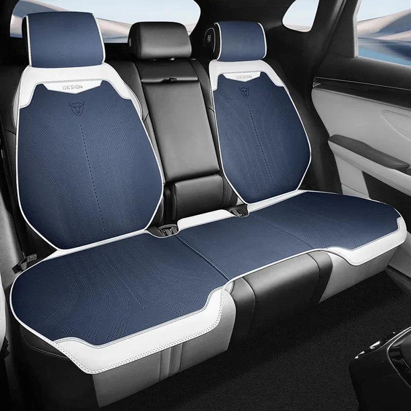 Navy blue and white perforated leather rear seat covers for BYD, featuring a premium textured design.