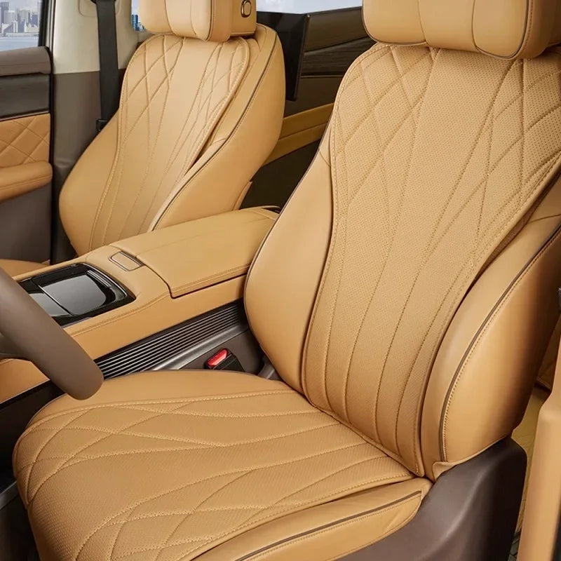 Premium tan perforated leather car seats with diamond quilted stitching