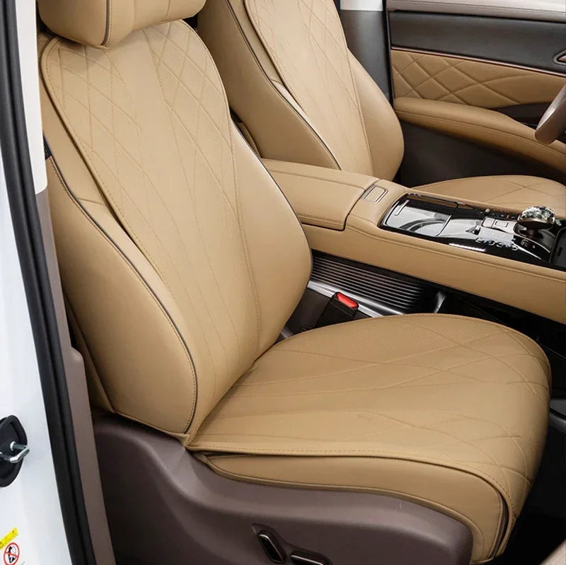 Tan diamond-stitched premium leather car seat covers for enhanced interior protection.