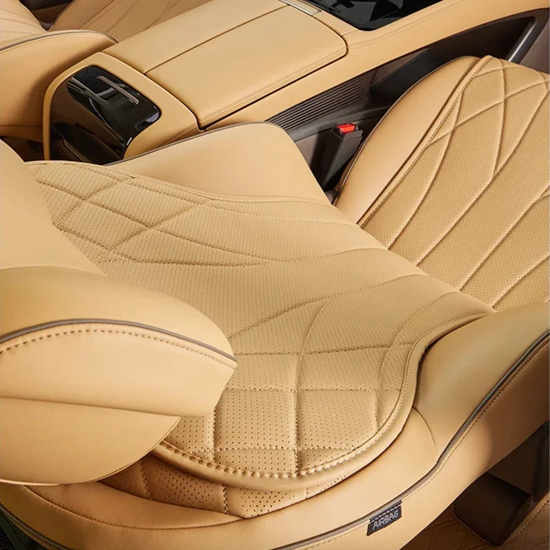 Tan perforated leather car seat covers with luxury diamond stitching design