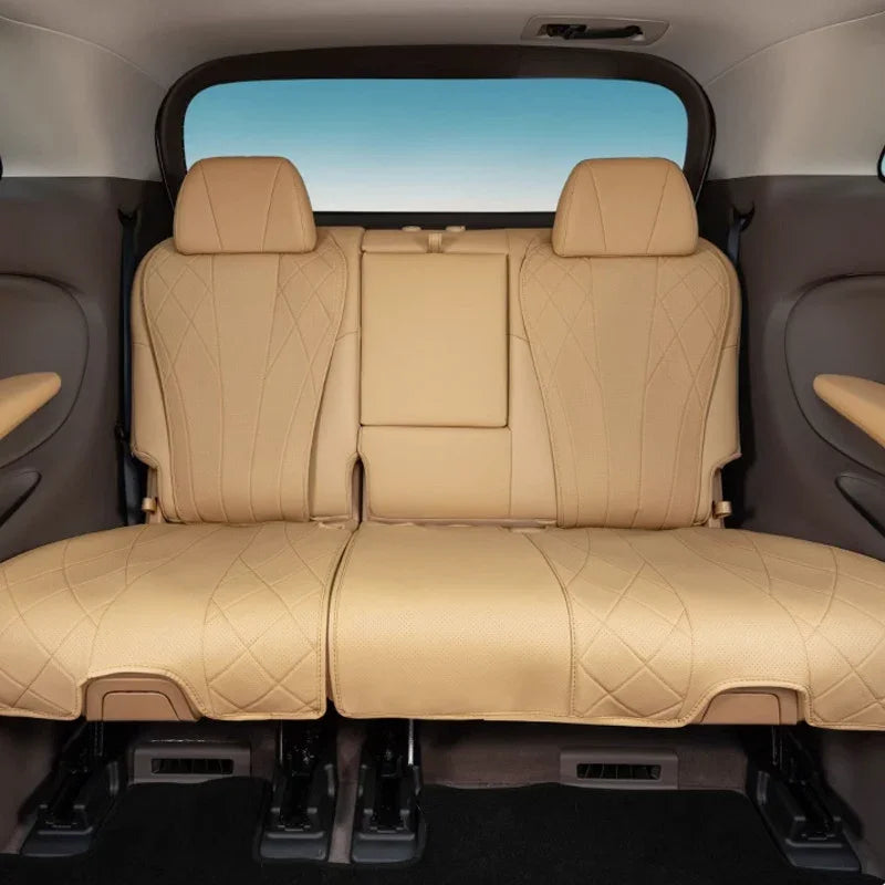 Beige quilted leather rear car seat covers with diamond stitching for luxury interior protection