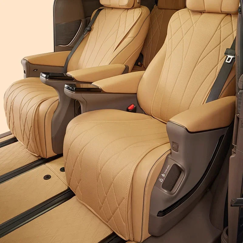 Luxurious tan quilted leather car seat covers with a professional diamond-stitch design.