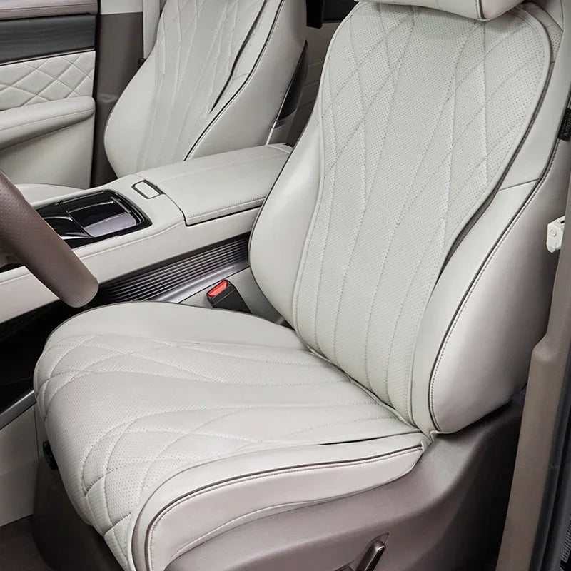 Professional light gray diamond-stitched leather car seat covers for interior protection.