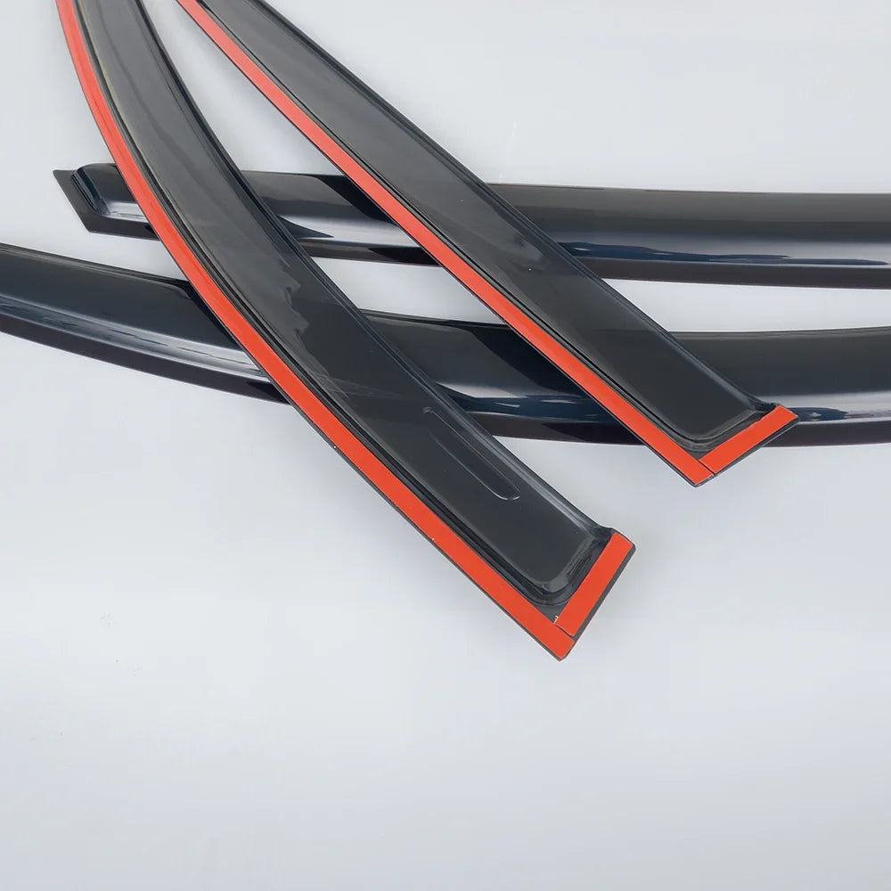 Glossy black car window weatherstrips with a vibrant red accent trim.