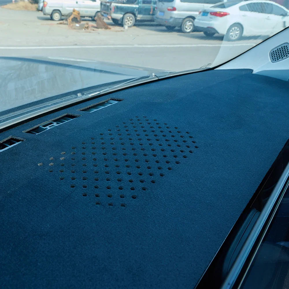 Professional black felt car dashboard cover with precision ventilation holes for a BYD vehicle.