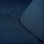 Close-up of navy blue car floor mat material featuring a durable anti-slip textured surface.