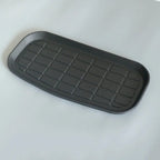 Black textured TPE car trunk tray with anti-slip grooves for durable protection.